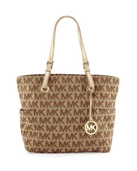 michael kors jet set signature logo tote handbag in brown|michael kors bag with airplanes.